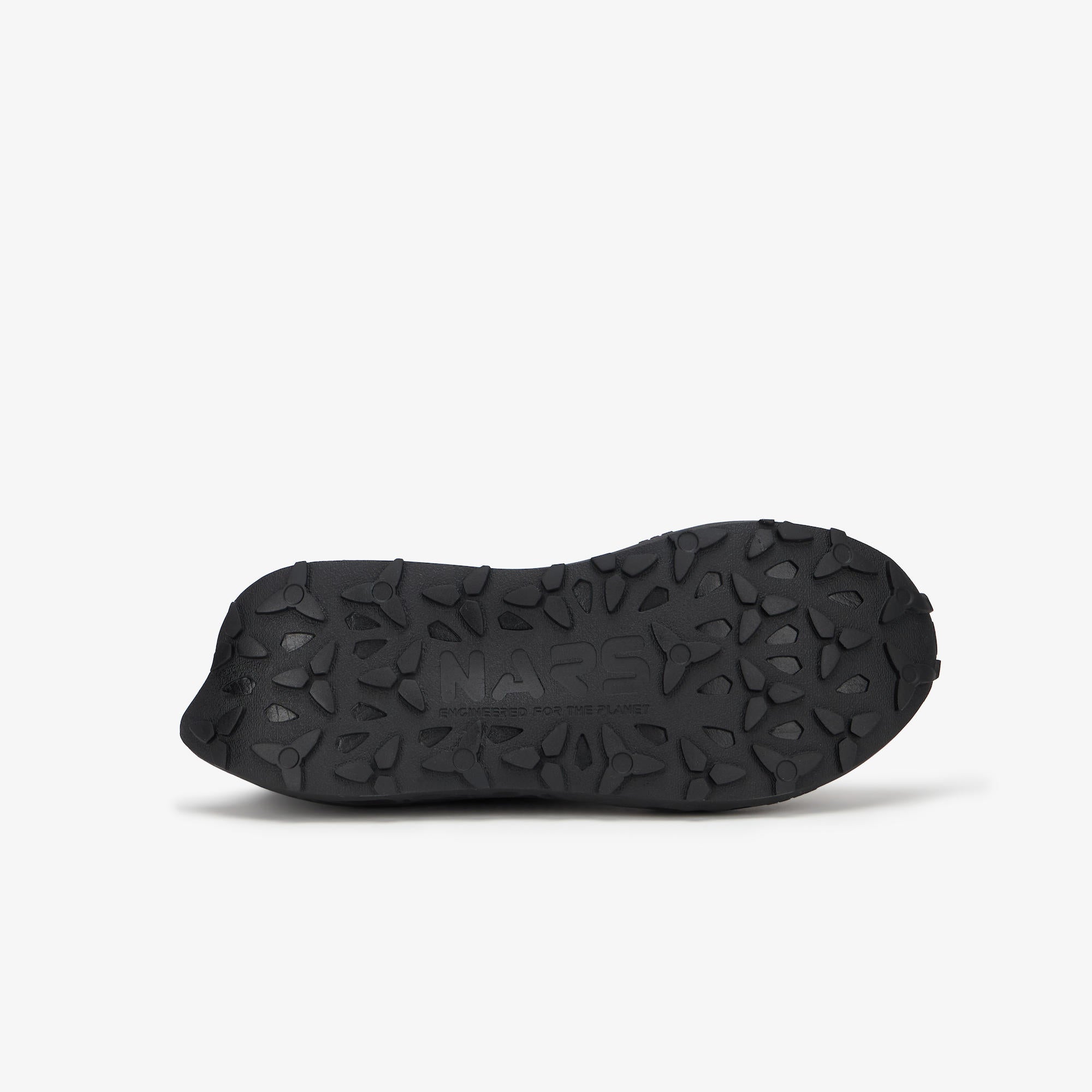 The black textured outsole of a shoe, featuring the embossed brand name 'NARS', shown against a plain light gray background.