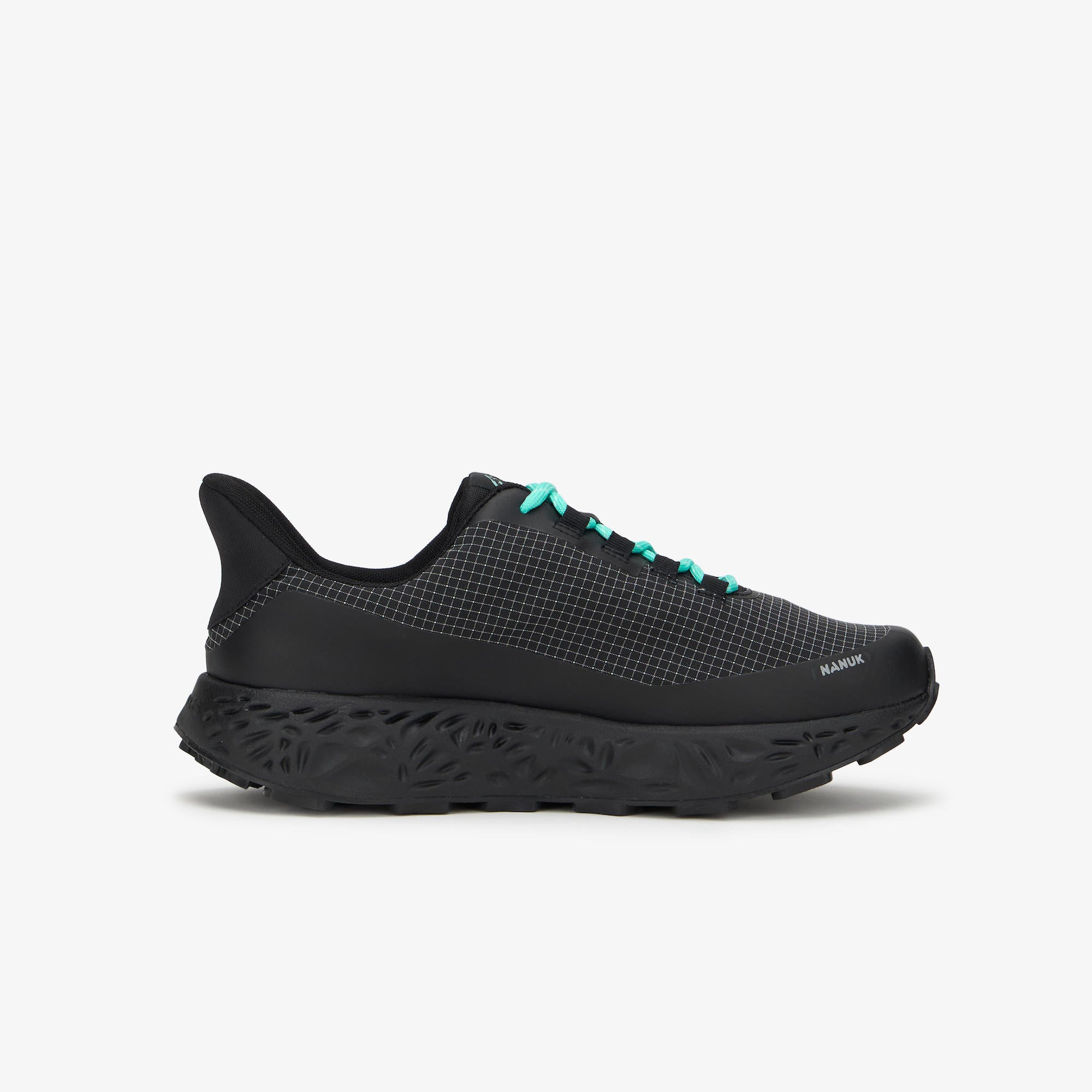 A black trail running shoe with bright turquoise laces, shown in a side profile on a light gray background.
