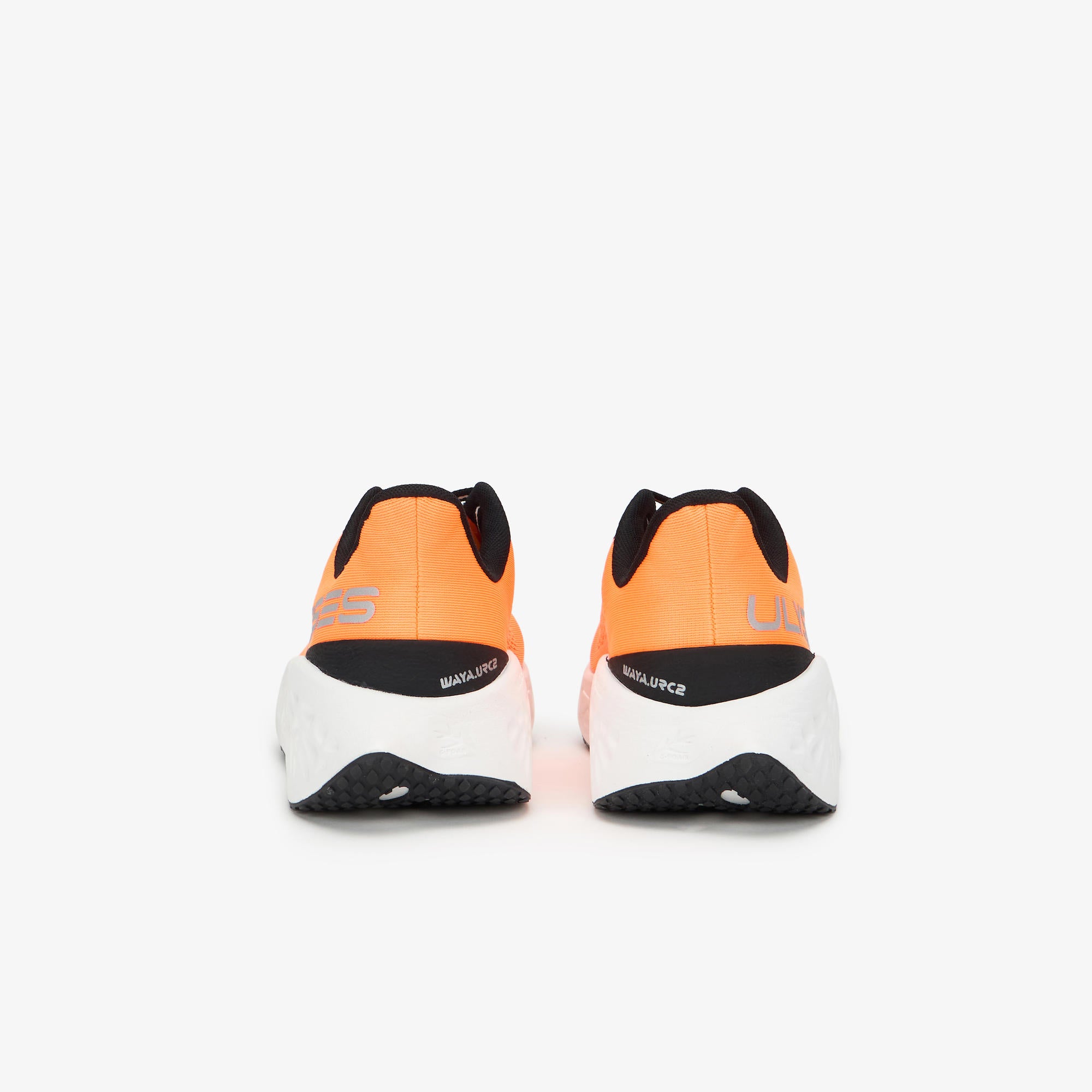 A pair of WAYA ULYSSES running shoes shown from the back, featuring a vibrant orange and white design with black accents