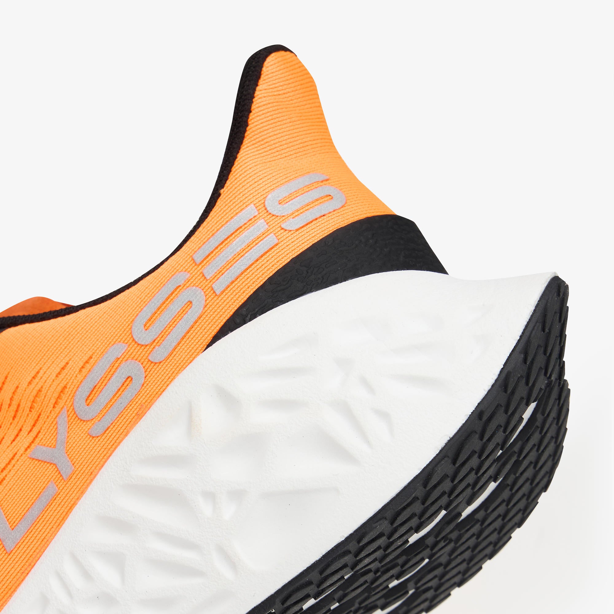 Close-up of a running shoe showing the heel and midsole, featuring a bright orange upper with a large silver 'ULYSSES' logo, a thick white midsole, and a black outsole.